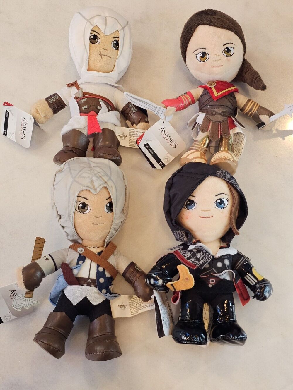 New Assassins Creed Plush Set (4) 9" Kassandra, Altair, Connor & Evie